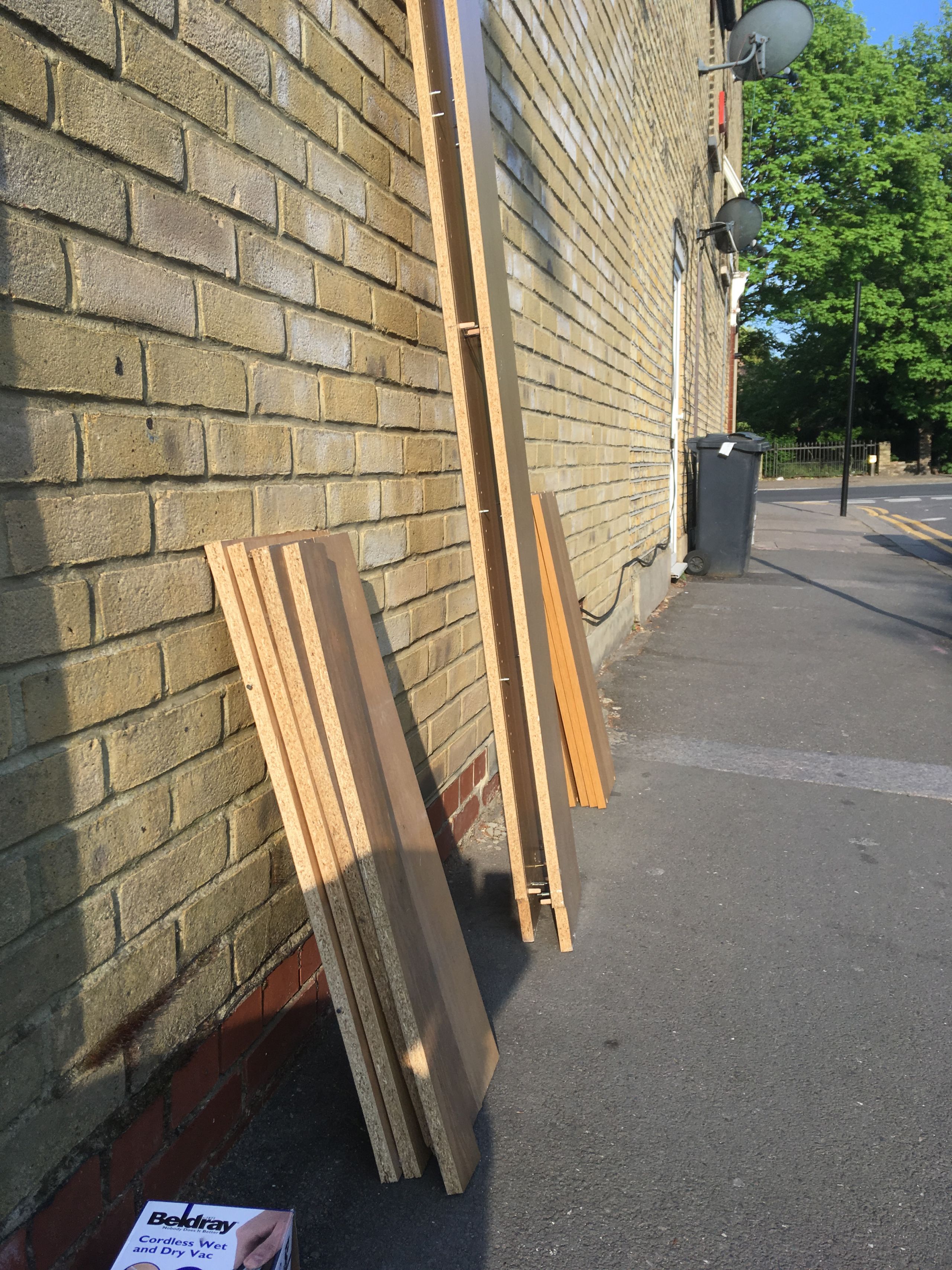 Fly-tipped Ikea wooden furniture on the streets of London, February and April 2020 © Earthsight